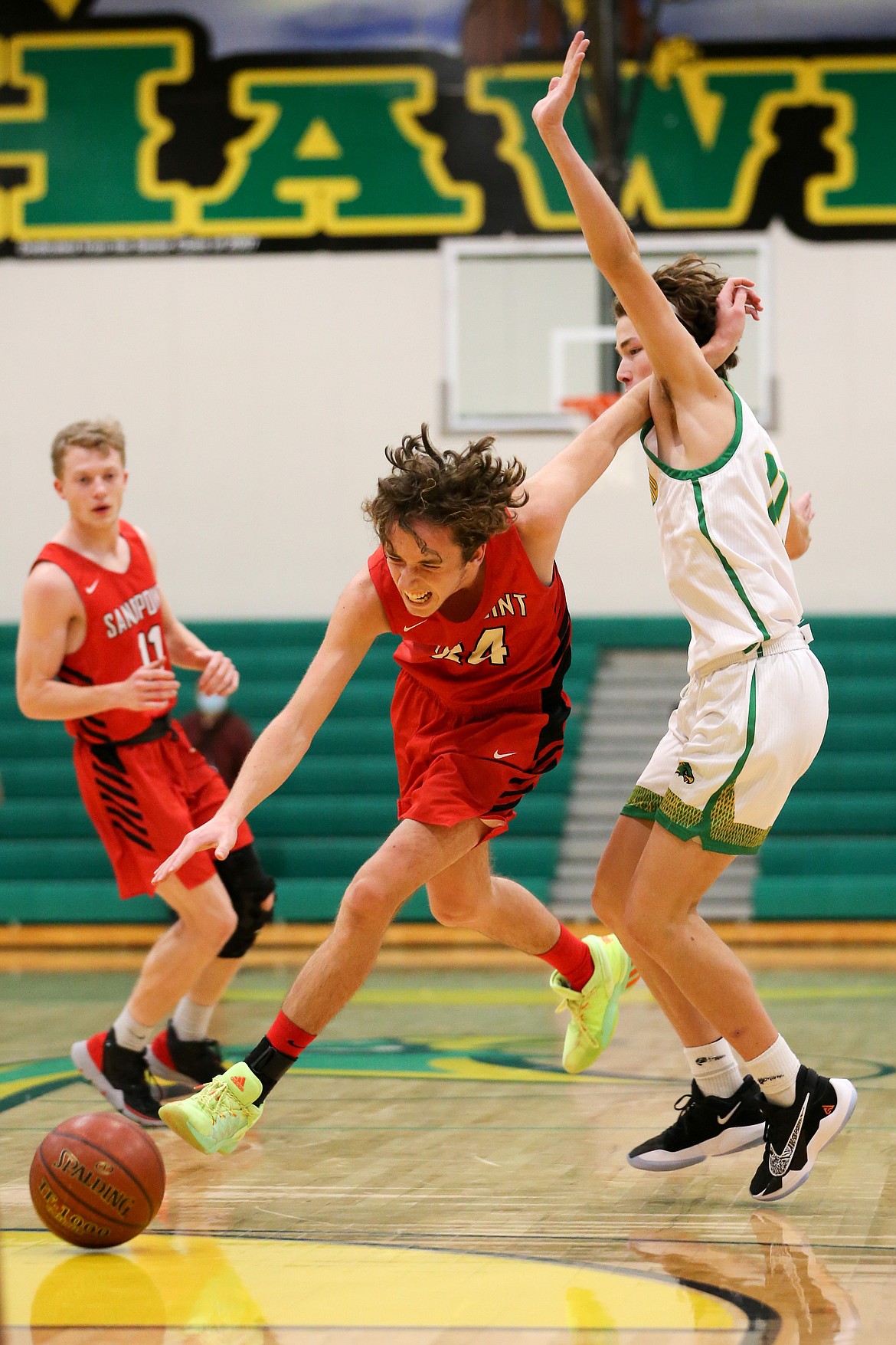 Sophomore Randy Lane fights through a Lakeland defender and attacks the paint on Friday.