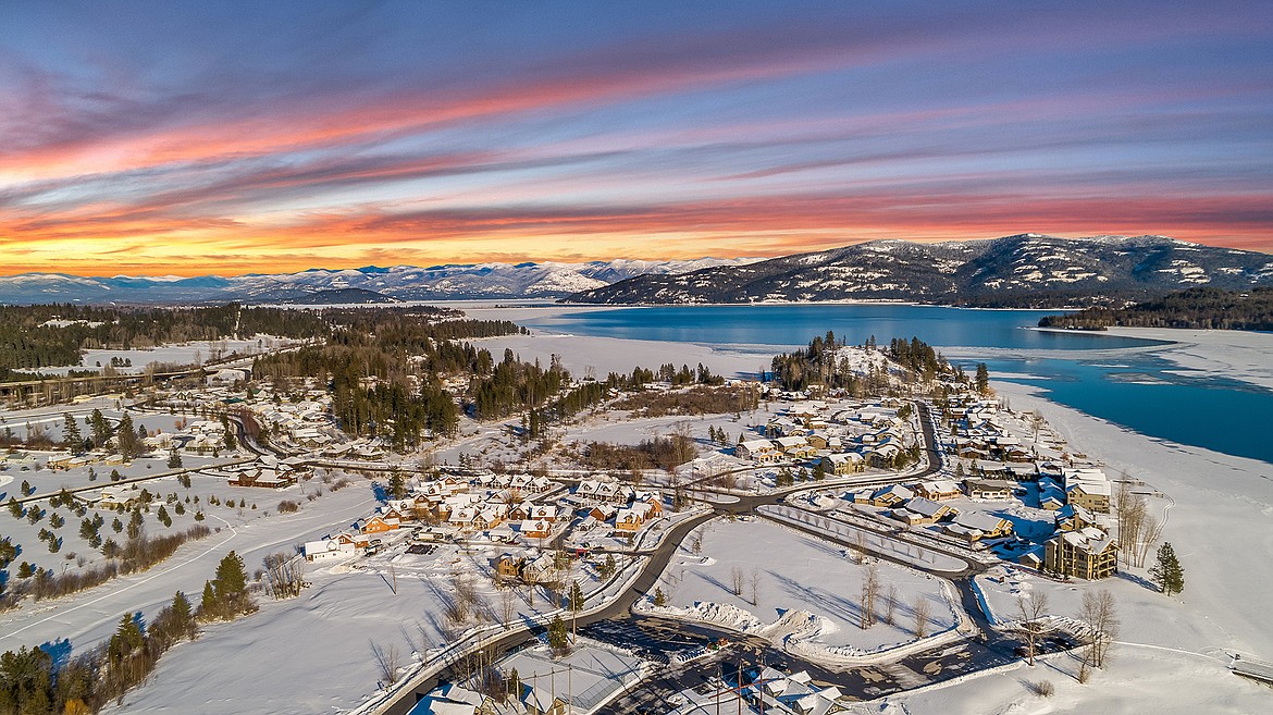 A snowy overhead view of the Dover Bay Waterfront Community on Lake Pend Oreille.