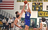 Cats come back to drop Bulldogs in OT on the road
