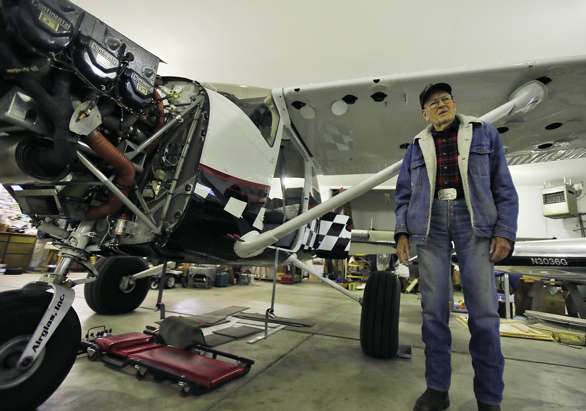 Coeur d'Alene Airport hangar owner Gene Soper discusses his many years in the aviation community as he stands next to a modified 182 Cessna in for inspection on Jan. 12. The airport is increasing in use as North Idaho continues to trend upward in popularity.