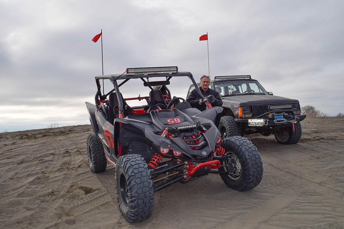 The Archer family's side-by-side and Jeep of the Sand Scorpions ORV group.