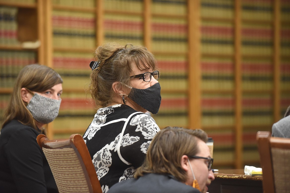 Danielle Jeanette Wood sits with members of her defense team in the Sanders County Courtroom Tuesday morning in Thompson Falls. Wood is accused of her murdering her ex-boyfriend, Matt LaFriniere, in 2018. (Scott Shindledecker/Daily Inter Lake)