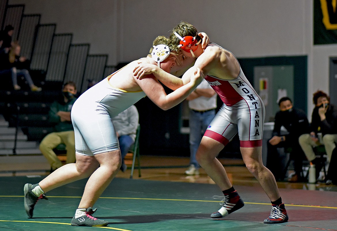 Whitefish's Kai Nash wrestles Cadogan Wheat from Hamilton on Saturday. The match ended in favor of Hamilton on a 10-6 decision. (Whitney England/Whitefish Pilot)