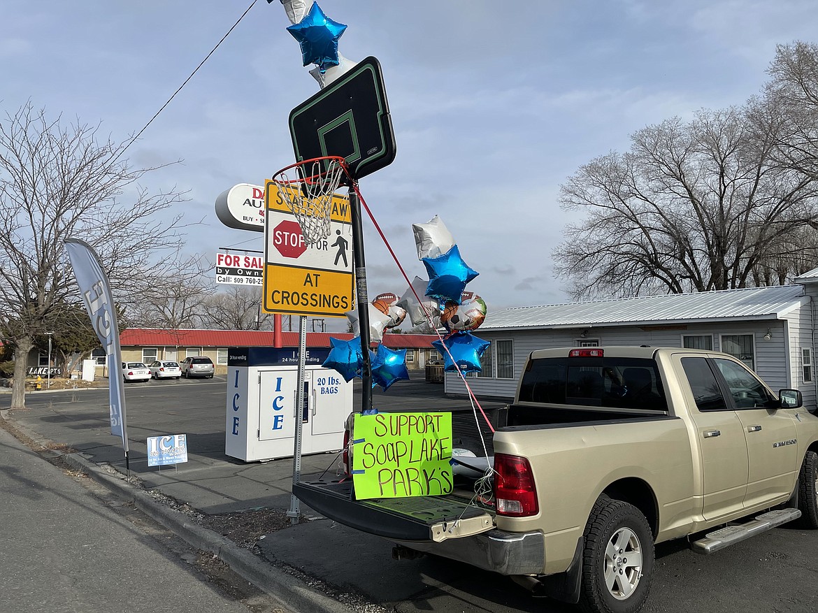 A display along S.R. 17 in Soap Lake encourages support for the city's drive to raise $25,000 to help build a new basketball court in Smokiam Park.