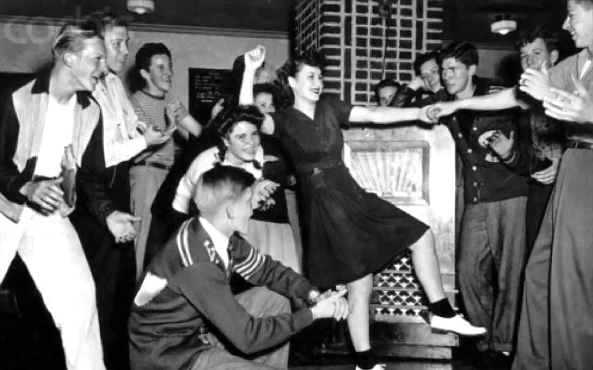 Dancing to jukebox music in the 1950s.