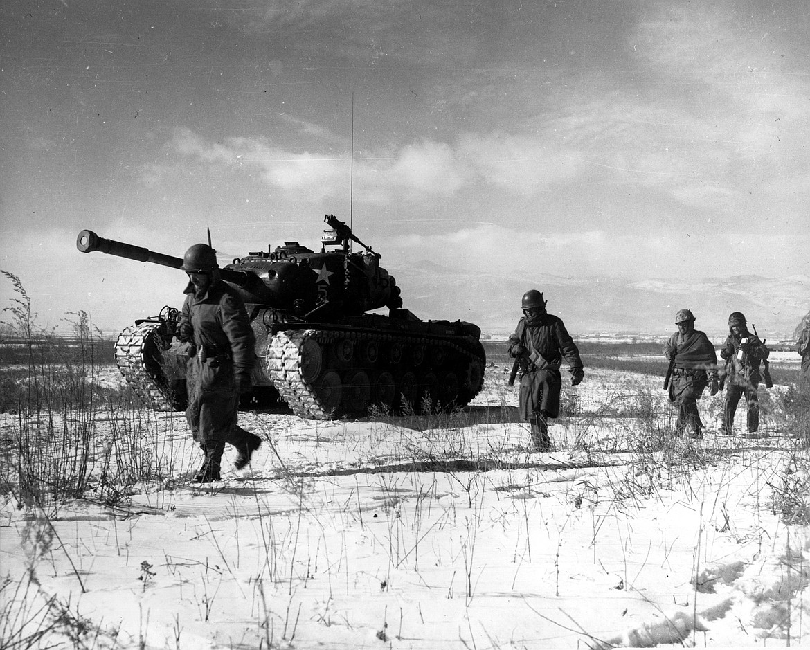 U.S. 1st Marine Division leaving area after Battle of Chosin Reservoir (“Frozen Chosin”) during the Korean War (1950).