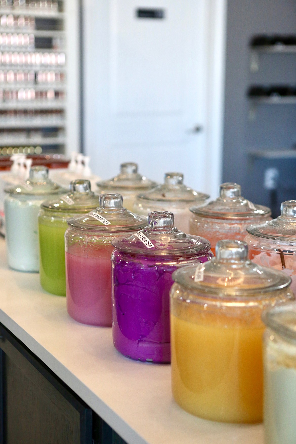 A colorful array of sugar scrubs tops a table at Posh Nails in Columbia Falls.
Mackenzie Reiss/Daily Inter Lake