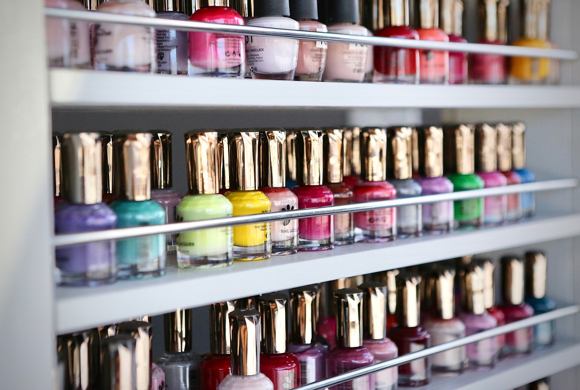 Polishes line shelves on the walls of Posh Nails in Columbia Falls. The newly renovated salon offers services ranging from basic manicures and pedicures to more elaborate treatments like ombre and acrylic nails. 
Mackenzie Reiss/Daily Inter Lake