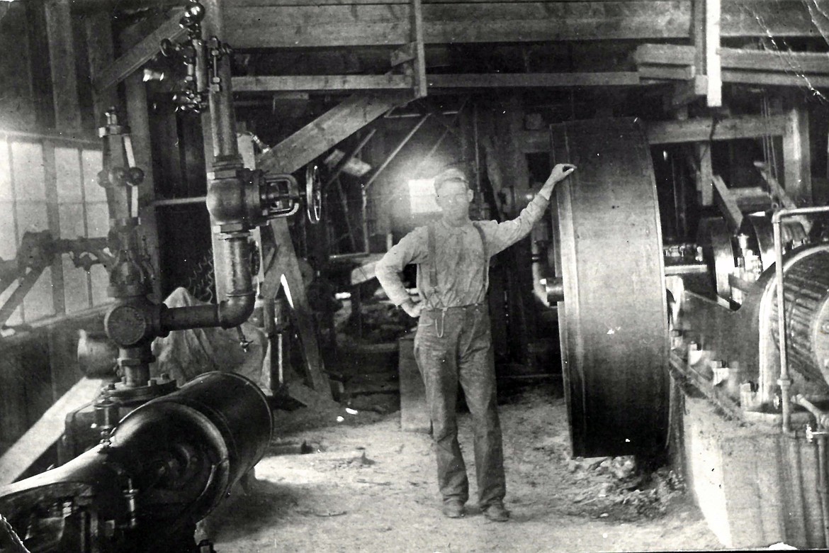 Levi Hensley is picturedin the engine room of the Jurgens mill, in 1913, probably about the time C.W. Beardmore purchased the mill.