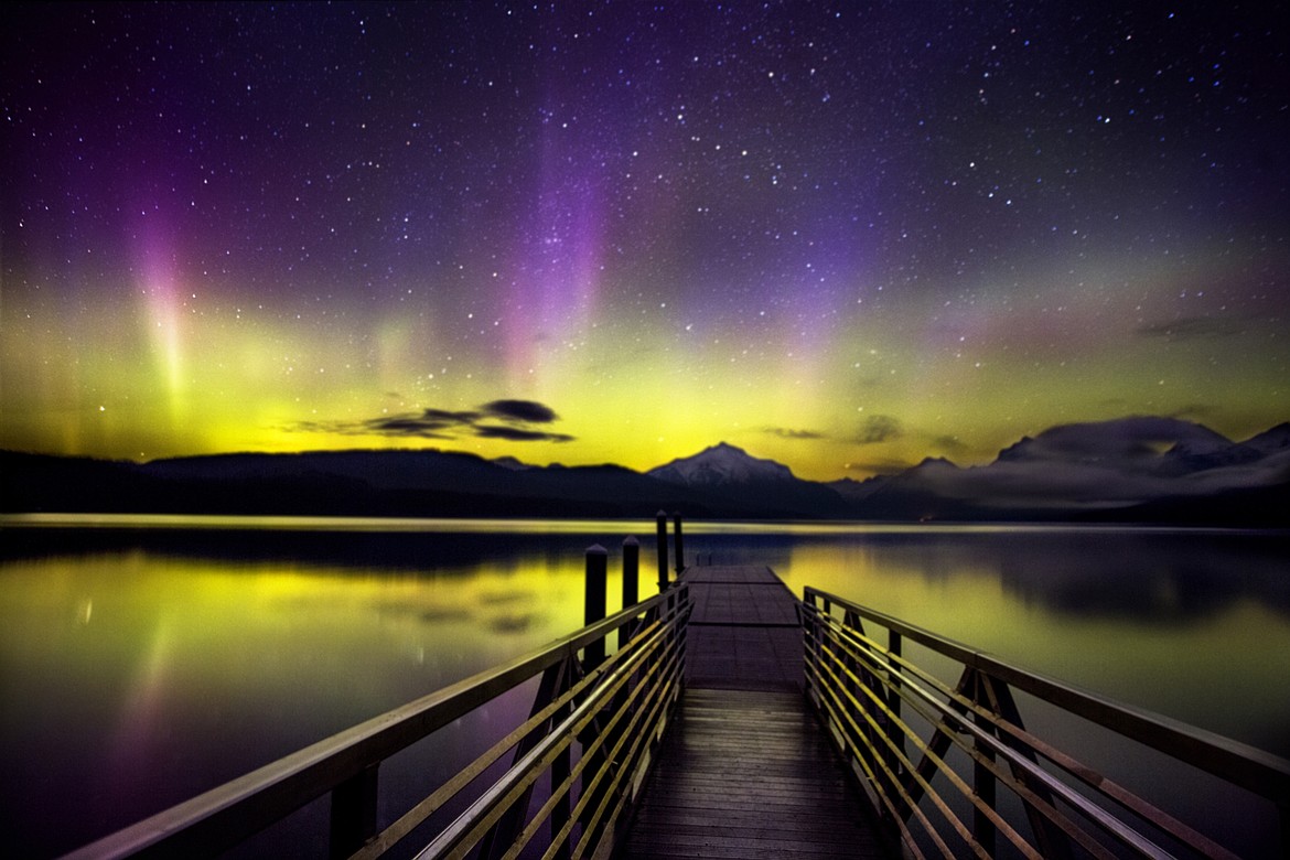 The northern lights reflect in the waters of Lake McDonald as seen from Apgar in April 2017. (Jeremy Weber/Daily Inter Lake)