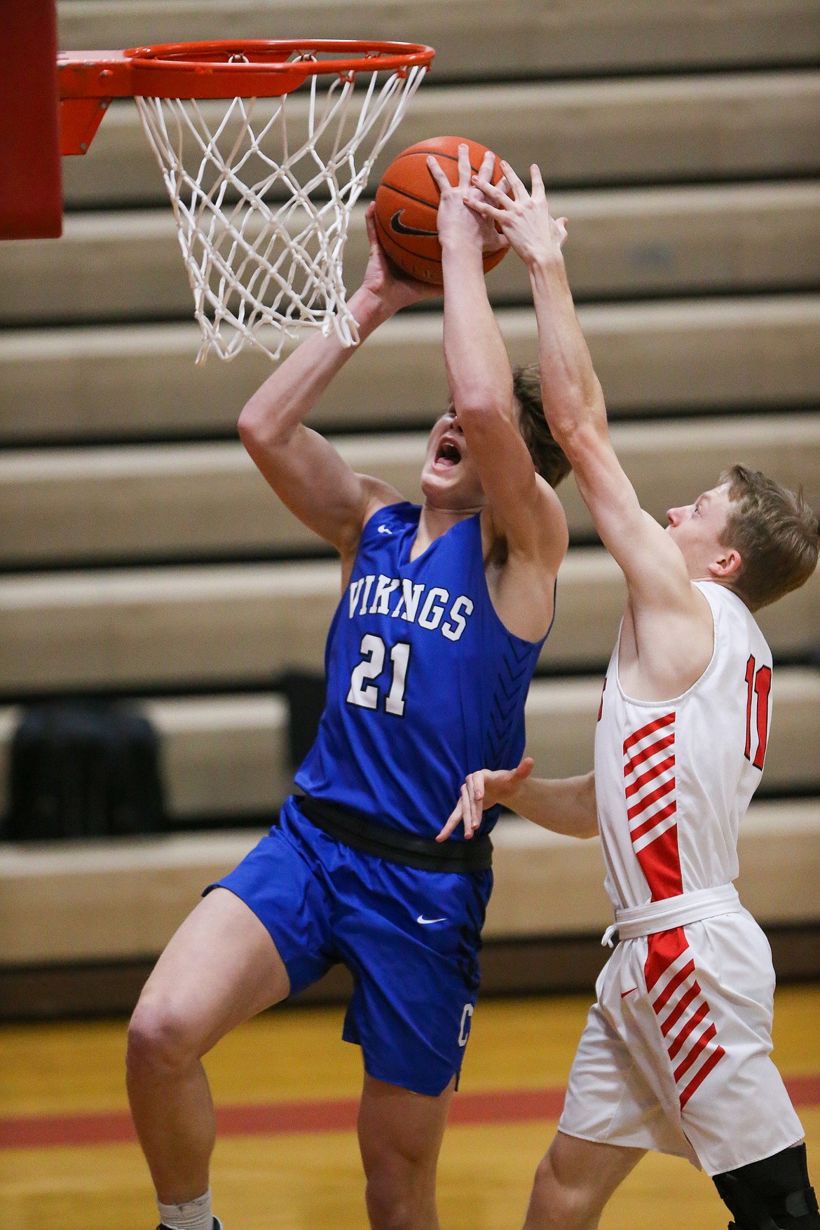 JASON DUCHOW PHOTOGRAPHY
Cameren Cope of Coeur d'Alene drives to the basket against Sandpoint on Thursday night in Sandpoint.