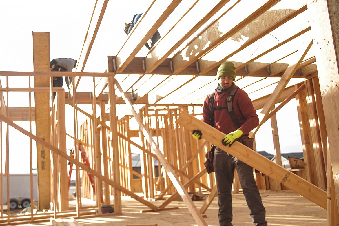 Miguel Charles builds the frame of Paradise Park homesite #03 on L Street.