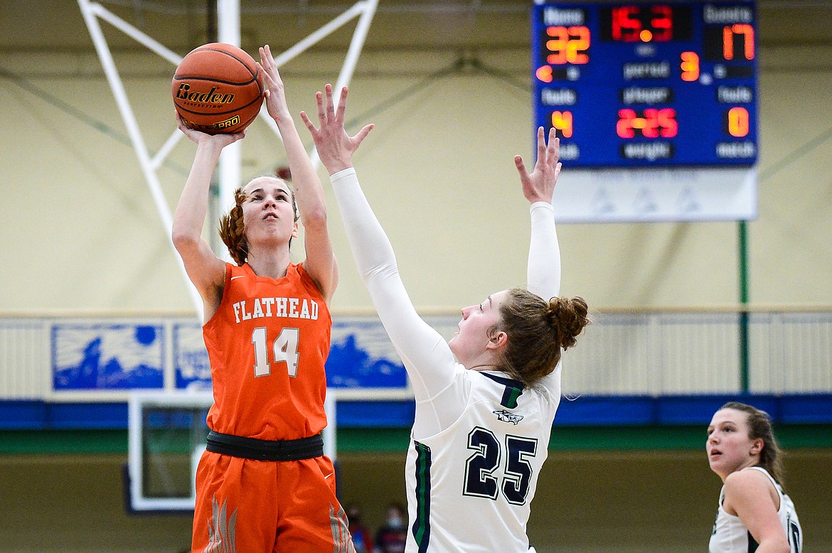 Flathead's Kennedy Moore (14) looks to shoot in the second half against Glacier at Glacier High School on Friday. (Casey Kreider/Daily Inter Lake)