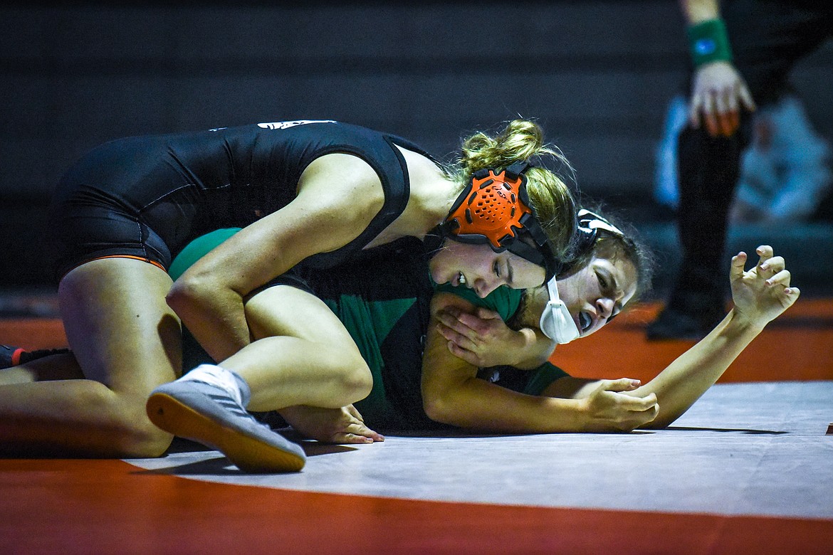 Flathead's Emma Gambino wrestles Glacier's Avery Anderson at 132 lbs. at Flathead High School on Friday. (Casey Kreider/Daily Inter Lake)