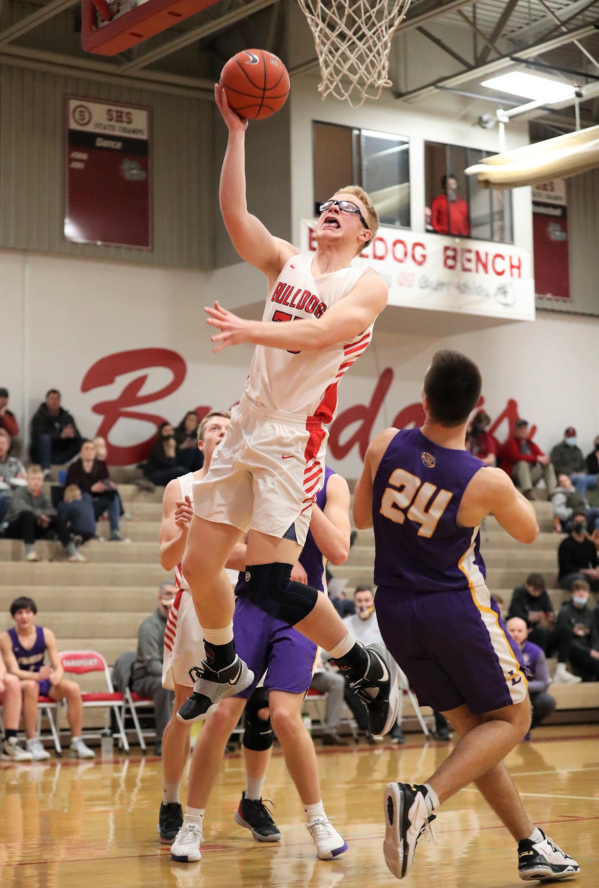 Ethan Butler converts a layup during the first half of Saturday's game.