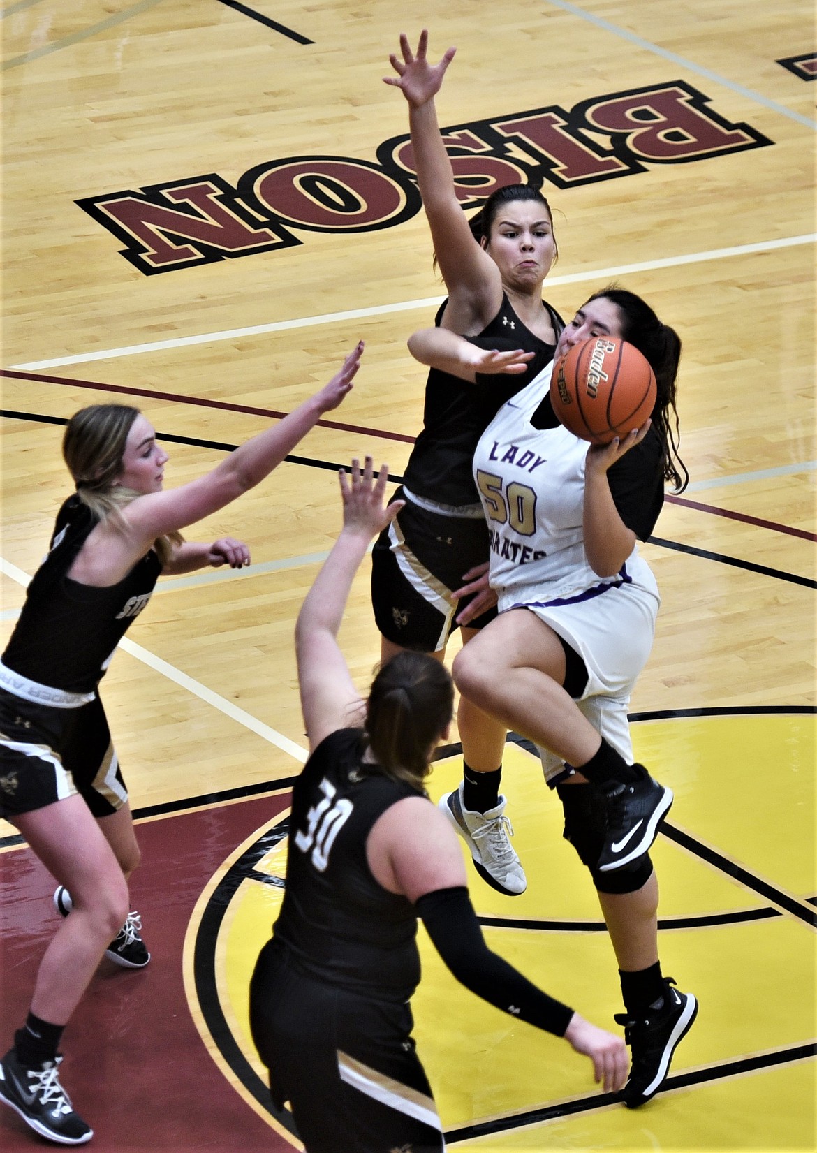 Polson's Mossy Kauley drives the lane against Stevensville. (Scot Heisel/Lake County Leader)