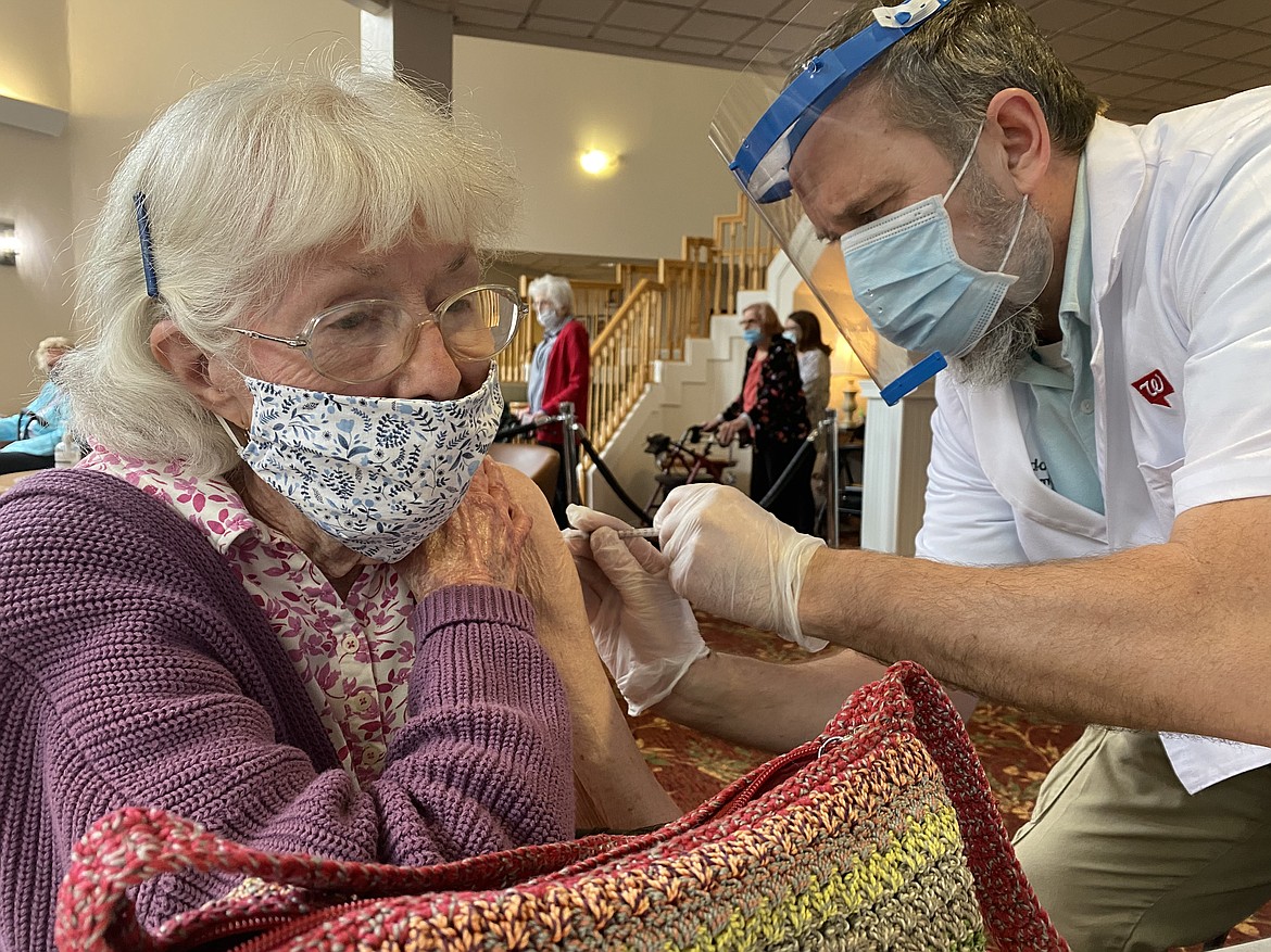 Walgreens pharmacist Rob Snijder takes extra care giving 86-year-old North Star resident Shirley Cicero her second round of the Pfizer vaccine. (MADISON HARDY/Press)