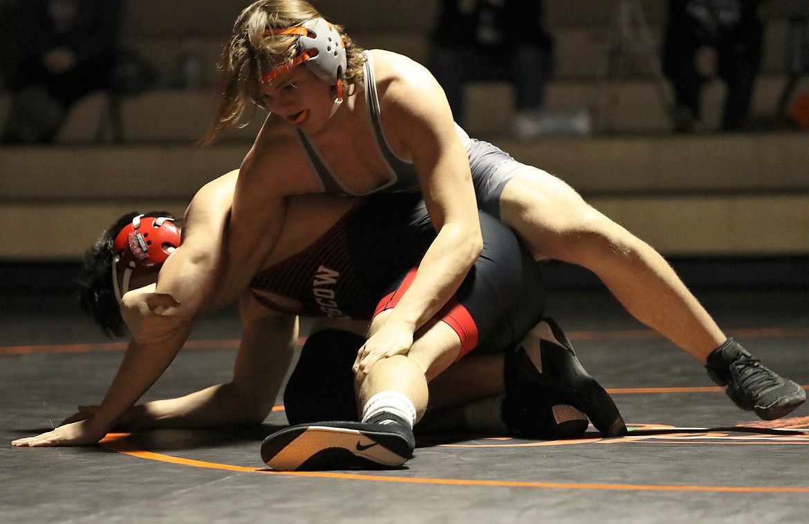 Priest River's Matyus McLain (top) prepares to pin his opponent in a 182-pound match on Jan. 20.