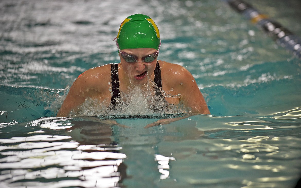 Ada Qunell swims to a first place finish in the Girls 100 Yard Breaststroke race at the Cat-Dog Invite Saturday at The WAVE. (Whitney England/Whitefish Pilot)