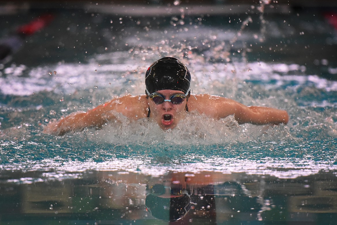 Sophi Logue battles her way to a first place finish in the 100 butterfly at the Cat/Dog Invitational in Whitefish Saturday.
Jeremy Weber