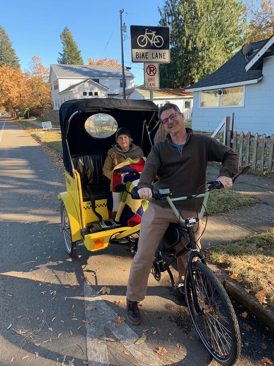Dave Passaro's brother Bob takes their mom, Jean, for a bike ride last fall. Jean was evicted from a memory care unit because of behaviors that Dave believes were brought on by isolation and other problems tied to COVID restrictions on visitation for memory care patients.
