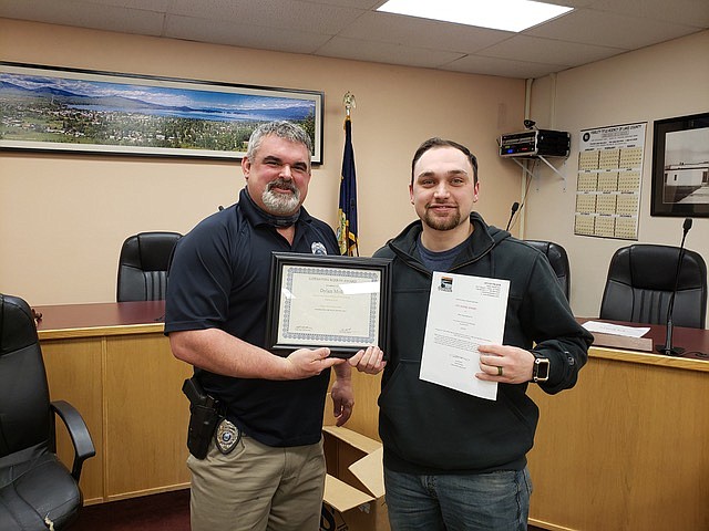 Polson Police Chief Wade Nash, left, and Officer Dylan Moll. (Courtesy of Polson Police)