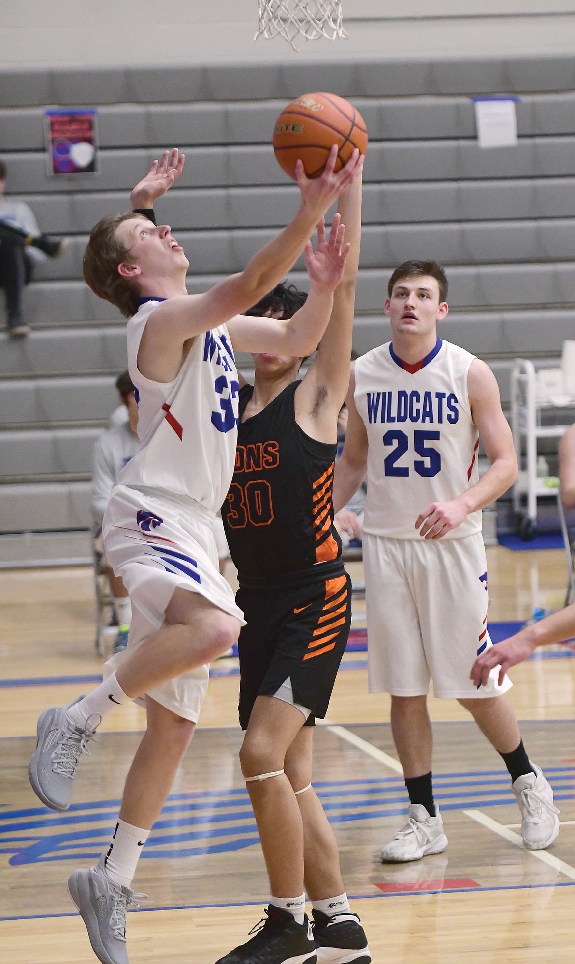 Aaron Trueblood makes the layup during a game against Eureka on Friday. (Teresa Byrd/Hungry Horse News)