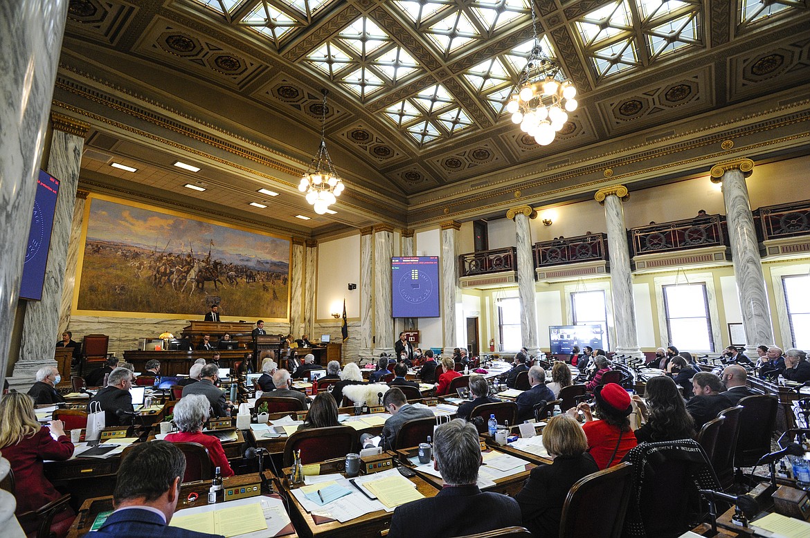 In this Jan. 25, 2021, file photo, the Montana House of Representatives holds a floor session in the State Capitol in Helena, Mont. The Montana House Judiciary Committee held a hearing Wednesday, Jan. 27, 2021, on a bill that seeks to protect free speech on public university campuses in the state, even as university administrators say their campuses already protect free speech. (Thom Bridge/Independent Record via AP, File)