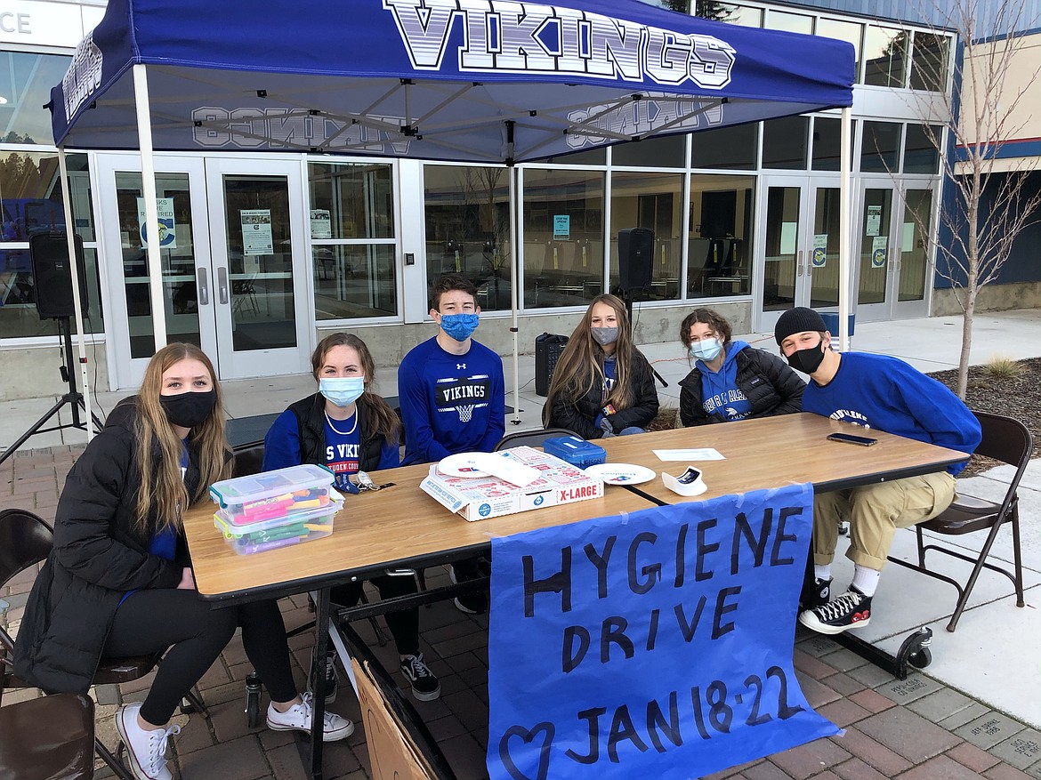 From left, junior Kalena Flowers, ASB president and senior Holly Hudson and seniors Owen Smith, Mckenzie Mattis, Lilian Smith and Chris Swider run the hygiene drive at Coeur d'Alene High School on Jan. 20.