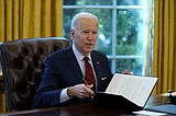 Biden opens sign-up window for uninsured as COVID-19 rages