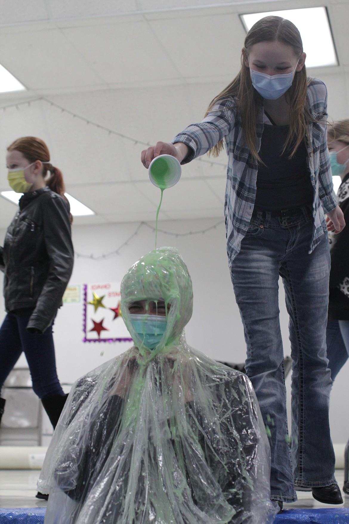 A student dumps slime on Principal Susie Luckey Thursday afternoon at  Idaho Hill Elementary.