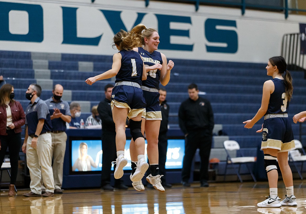 JASON DUCHOW PHOTOGRAPHY
Timberlake seniors Taryn Soumas (1) and Brooke Jessen (20) are introduced before a nonleague game at Lake City High on Dec. 4.