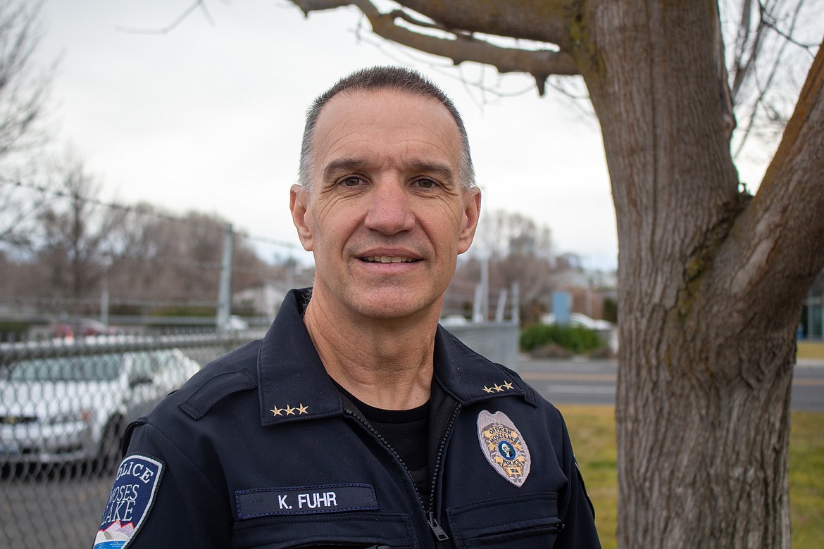 Moses Lake Police Chief Kevin Fuhr poses for a photo on Tuesday afternoon outside the police station in Moses Lake.