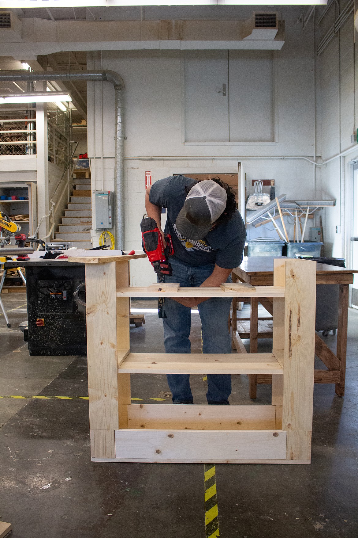 Austin Kern works on a project in the wood shop at MLHS on Tuesday afternoon.