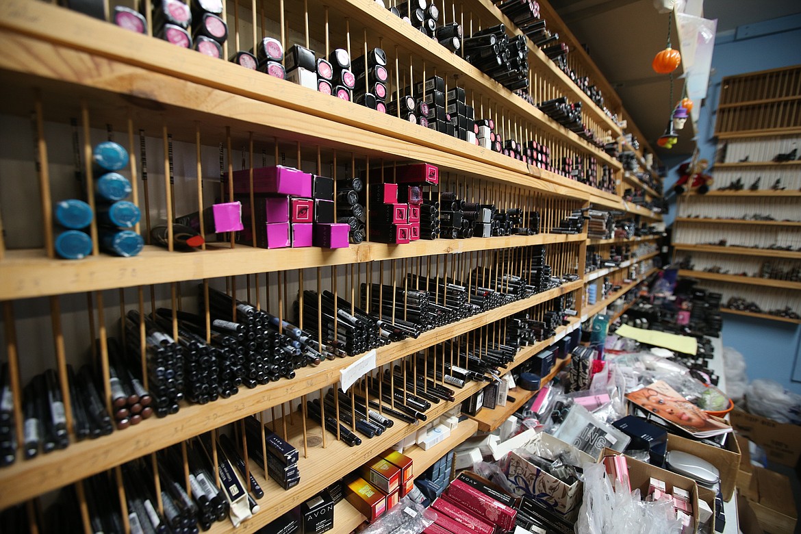 Products fill shelves on a wall in  "Rose's Avon Shoppe" on Best Avenue.