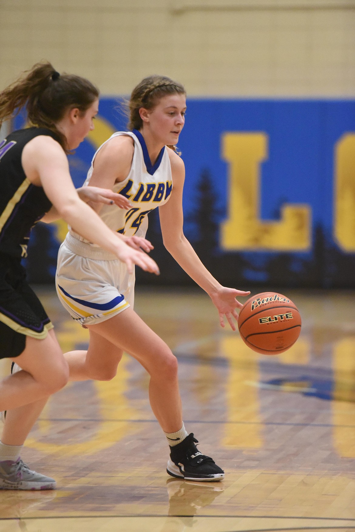 Libby senior Elise Erickson drives the ball during the Lady Loggers Feb. 2 game against Polson. (Will Langhorne/The Western News)