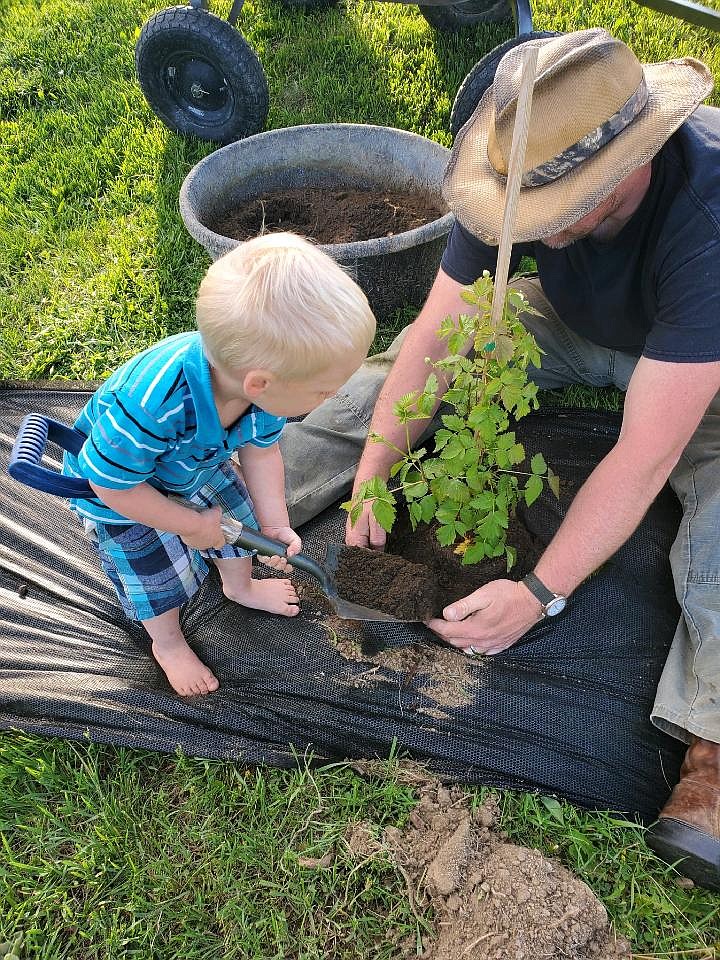 Members of the Jones family are pictured doing chores on the family's farm.