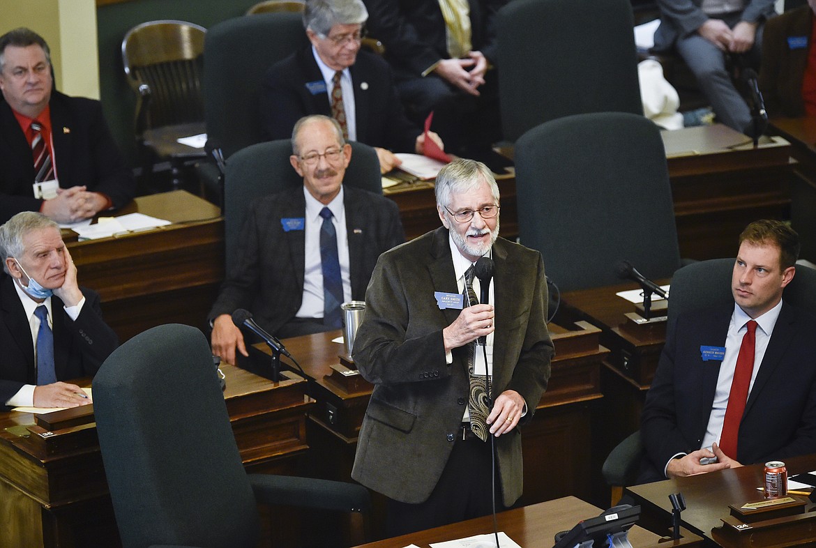 FILE - In this Nov. 18, 2020 file photo New Senate Majority Leader, Sen. Cary Smith, R-Billings, addresses the republican senate caucus at the Montana State Capitol in Helena, Mont. A Montana Senate committee considered Wednesday, Feb. 3, 2021, a bill that would require parental consent for sexual education and ban abortion providers from offering information in schools. (Thom Bridge/Independent Record via AP, file)