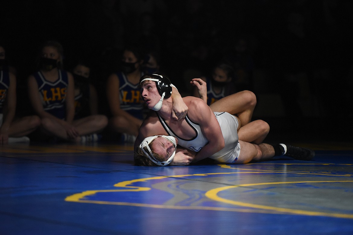 Libby senior Xander Spady pins Frenchtown's John Warner during a Feb. 5 dual. (Will Langhorne/The Western News)