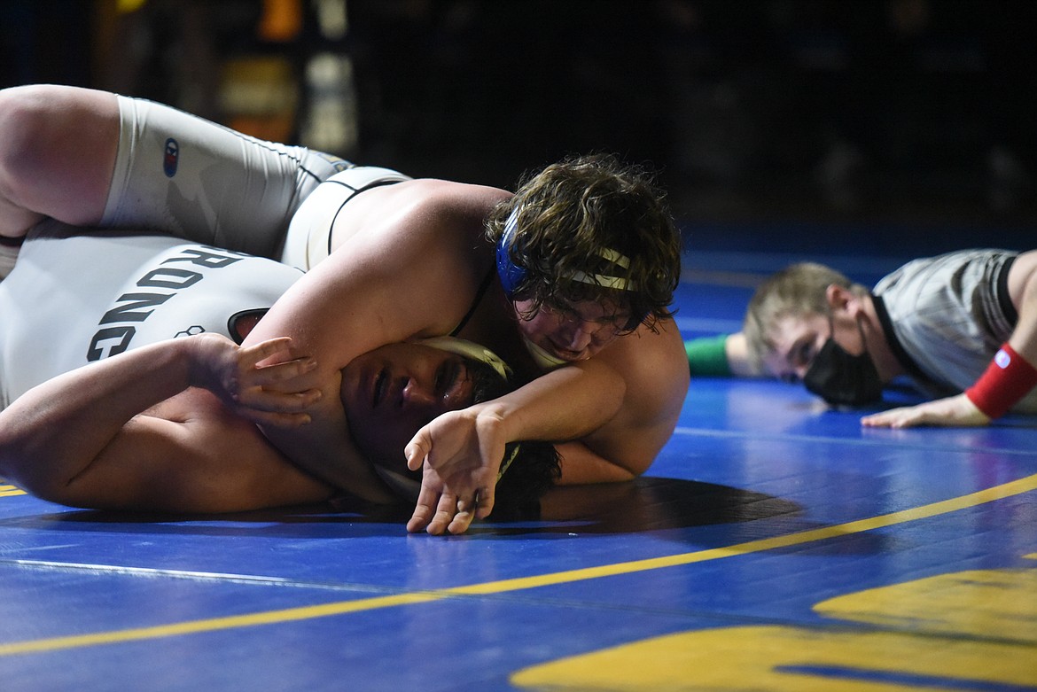 Greenchain junior Aydan Williamson pins Frenchtown's Philip Herald during a Feb. 5 dual. (Will Langhorne/The Western News)