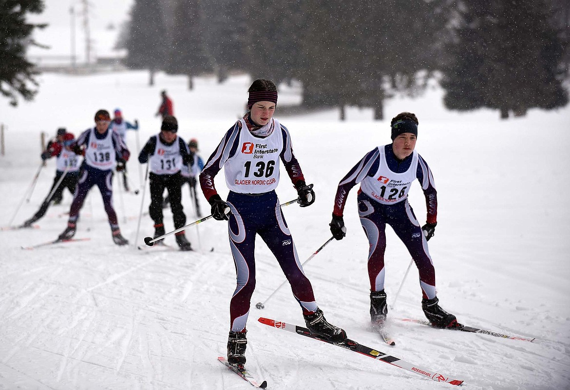 In the 4K race, Findley Dezzani, center, and Reid Alexander lead a group os skiers Saturday morning  during Glacier Nordic Center’s Winter Carnival freestyle ski race at Whitefish Lake Golf Club. (Heidi Desch/Whitefish Pilot)