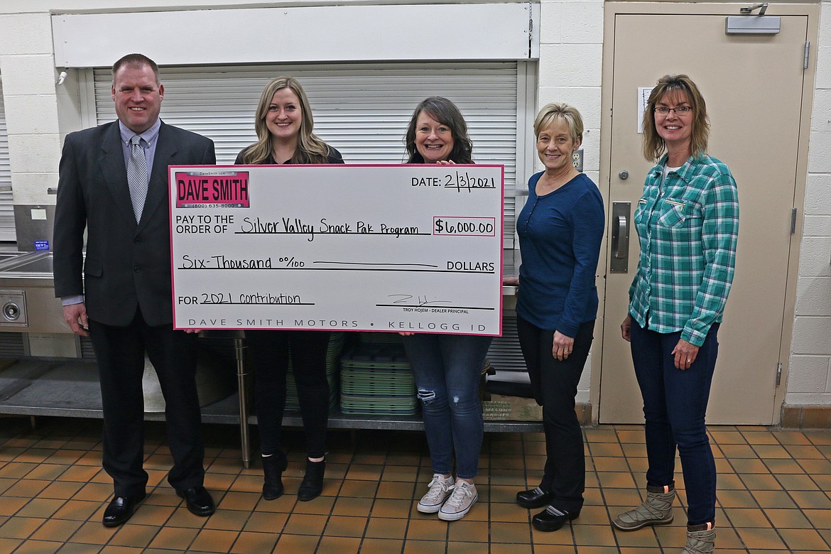 Dave Smith Motors donated $6,000 to the Silver Valley Snack Pak Program, which will fund the program for an entire year. Pictured are Dealership Principal Troy Hojem, Community Involvement Coordinator Bridget Hojem, Snack Pak Program President Christy Jacobs, Snack Pak Program Treasurer Mary Bren and Snack Pak Secretary Trecia Brantz.