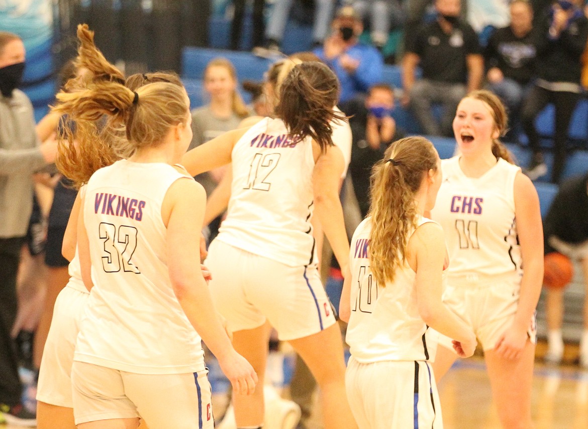 JASON ELLIOTT/Press
Coeur d'Alene's Madi Symons waits for her teammates to leave the bench following Tuesday's 5A Region 1 girls basketball championship game at Viking Court. Coeur d'Alene beat Lake City 55-49 to advance to the state tournament starting Feb. 20 at the Ford Idaho Center in Nampa.