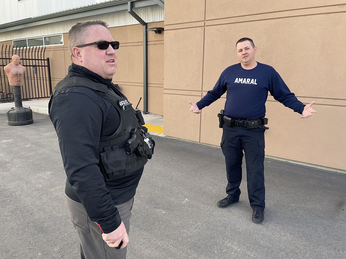 Grant County Sheriff's Office Lt. Dean Hallett prepares to pepper spray Quincy Police Officer Gary Amaral during a training session last Thursday.