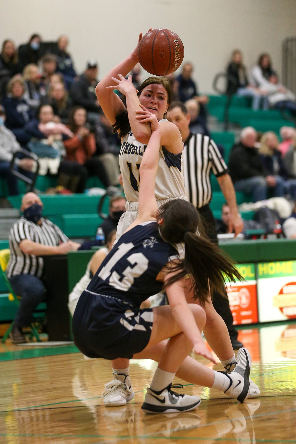 JASON DUCHOW PHOTOGRAPHY
Bernie Carhart (11) of Timberlake looks to pass to a teammate as Mia Blackmore (13) of Bonners Ferry defends on Tuesday night in the 3A District 1 girls basketball championship game at Lakeland High in Rathdrum.