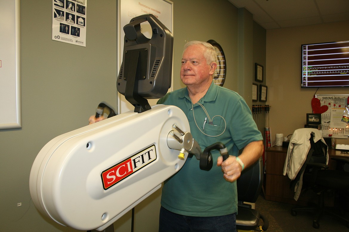 David Hofheins uses an exercise machine during a class in the cardiac rehabilitation program at Samaritan Healthcare.