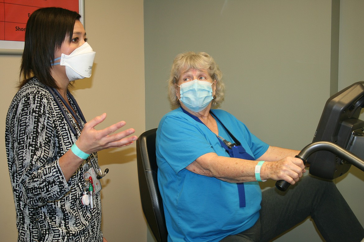 Jennifer Estep, lead exercise physiologist for the cardiac rehabilitation program at Samaritan Hospital, talks to patient Petra Hovland.