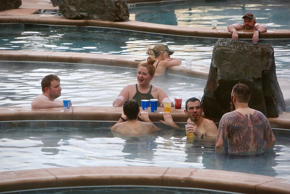 A small group of swimmers chat between pools over drinks at Quinn's Hot Springs Resort.
Mackenzie Reiss/Daily Inter Lake