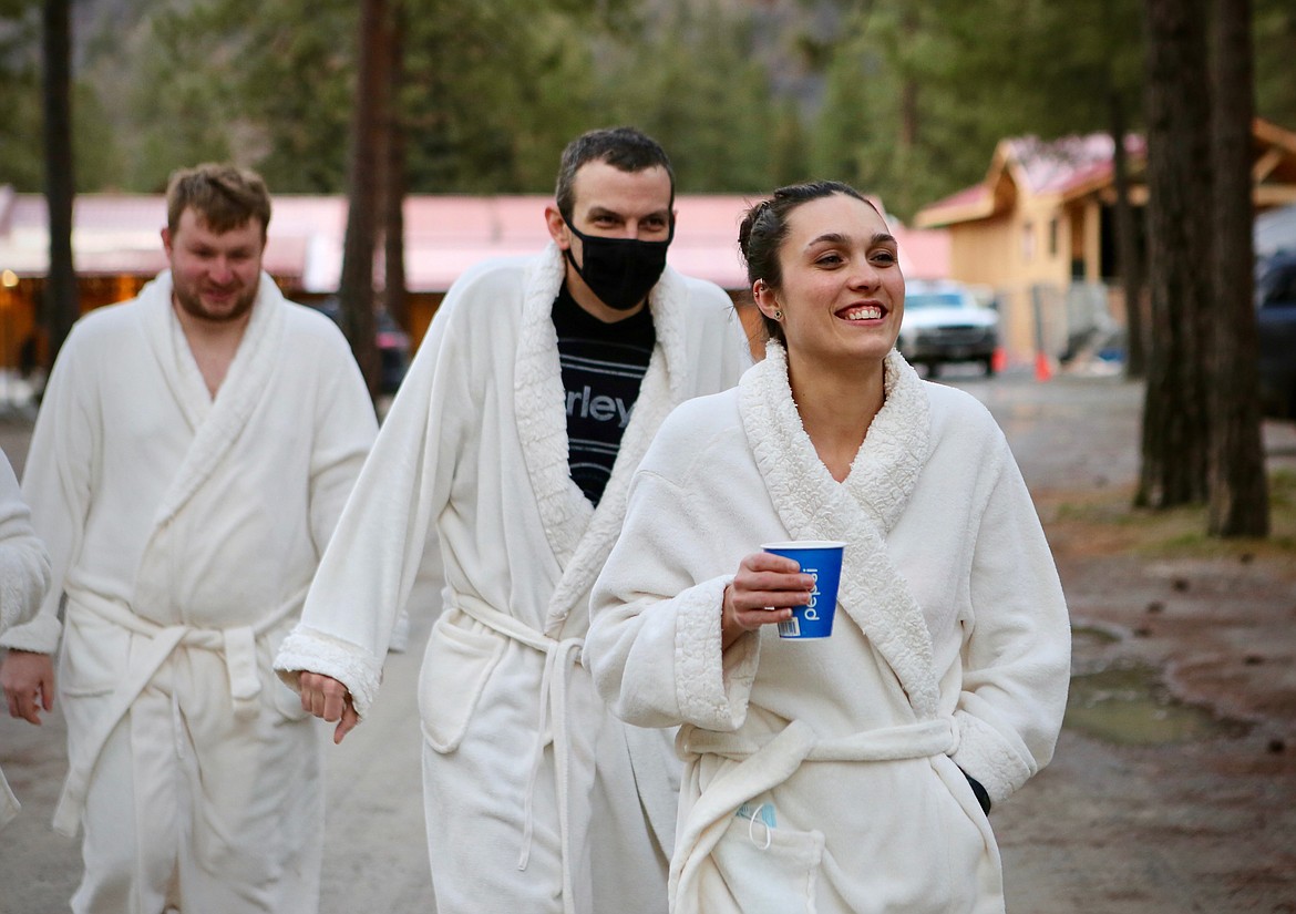 Birthday girl, Kami Smith, of Spokane Valley, Washington, heads back to her cabin with  Shayne Tuckness, Nicolas Smith and Lindsey Tuckness (not pictured). 
Mackenzie Reiss/Daily Inter Lake