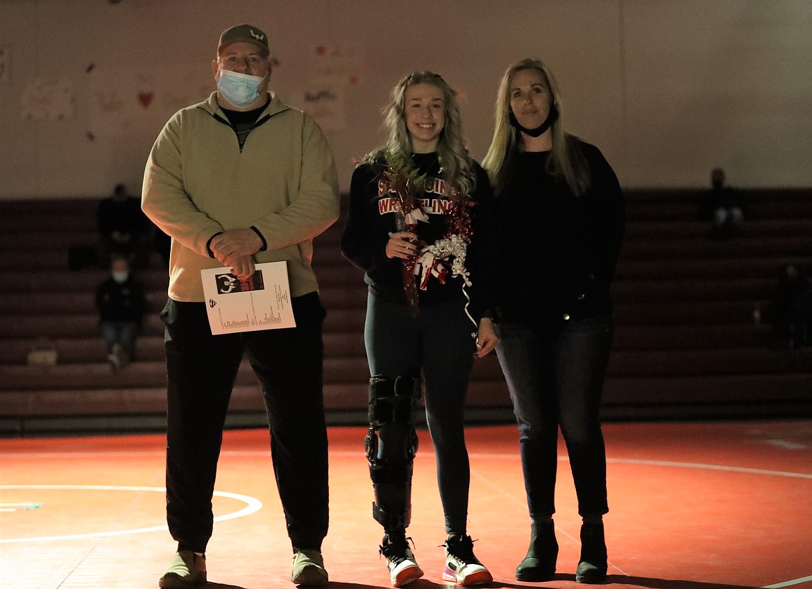 Kayelin Johansen celebrates Senior Night with her family.